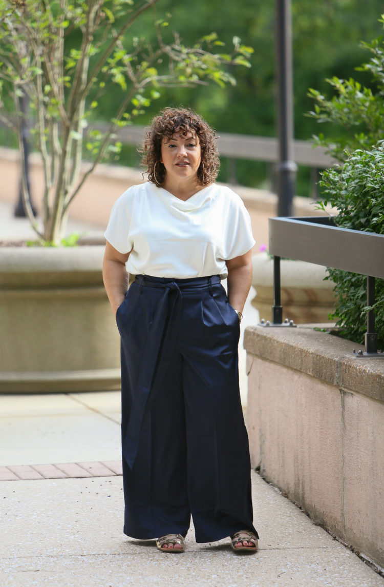 Wardrobe Oxygen in the Universal Standard Tresa Wide Leg pants and Viva Boatneck with Jenny Bird jewelry and a Clare V. Foldover Clutch 