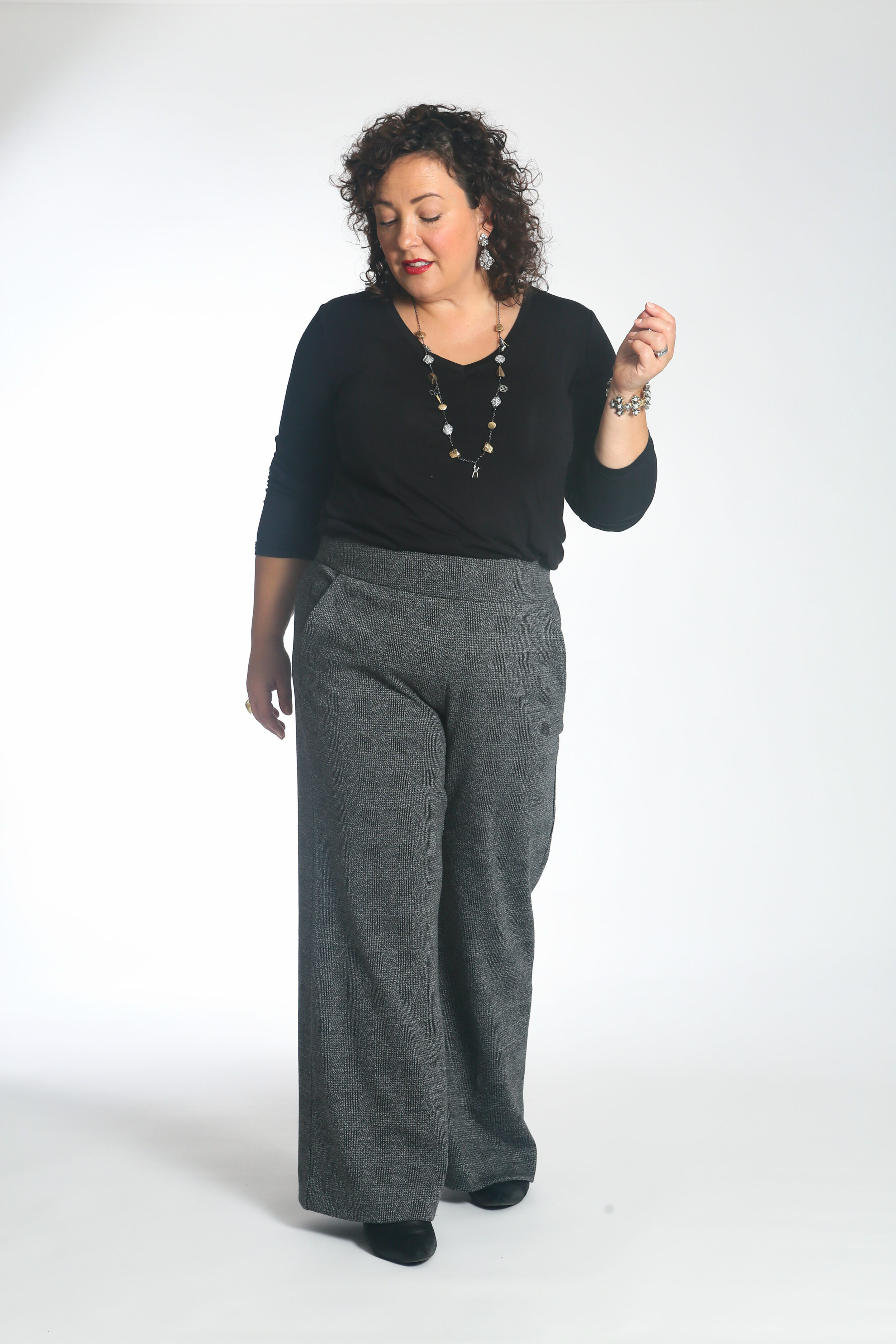 Wardrobe Oxygen in the cabi Reveal Tee tucked into the Bond Trouser