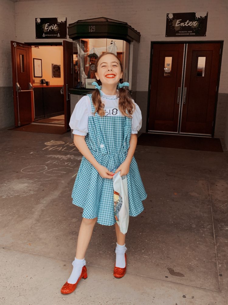 young girl dressed as Dorothy from the Wizard of Oz