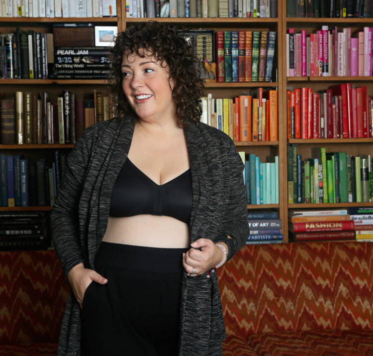 Alison of Wardrobe Oxygen wearing a wireless bra for large busts from Soma under a gray cardigan