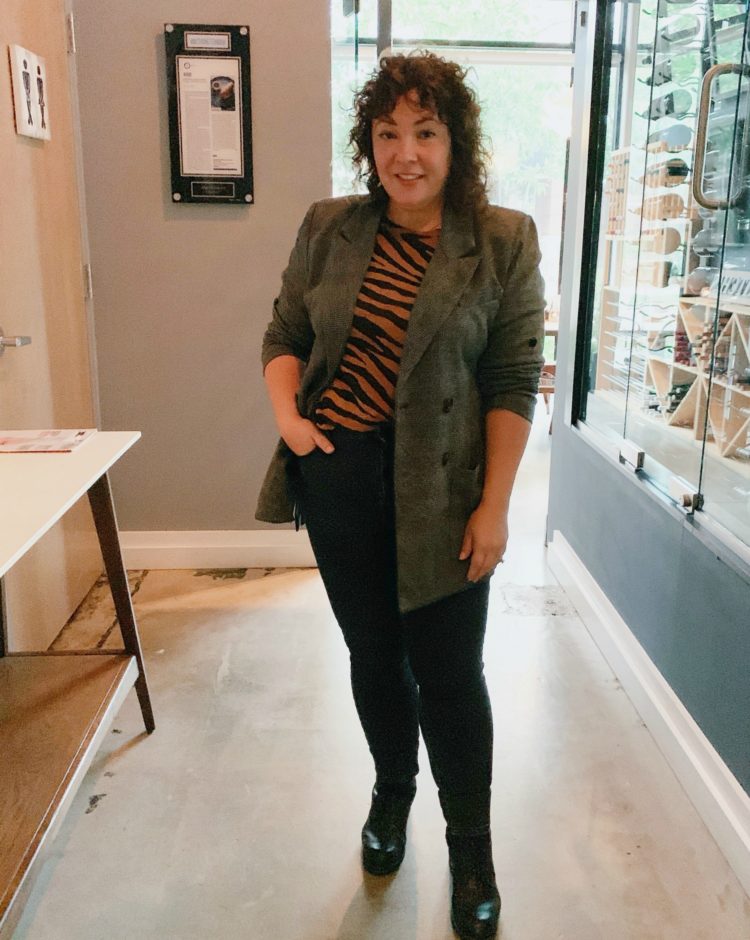 Wardrobe Oxygen in the cabi Bond Blazer with a Banana Republic zebra print t-shirt and Everlane jeans