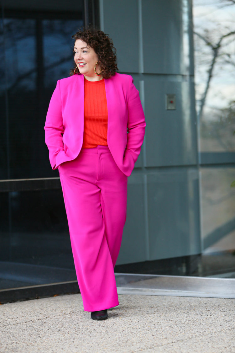 hot pink wide leg pantsuit from Banana Republic with an orange red merino wool crewneck sweater and leopard faux fur coat as seen on over 40 fashion blogger wardrobe oxygen