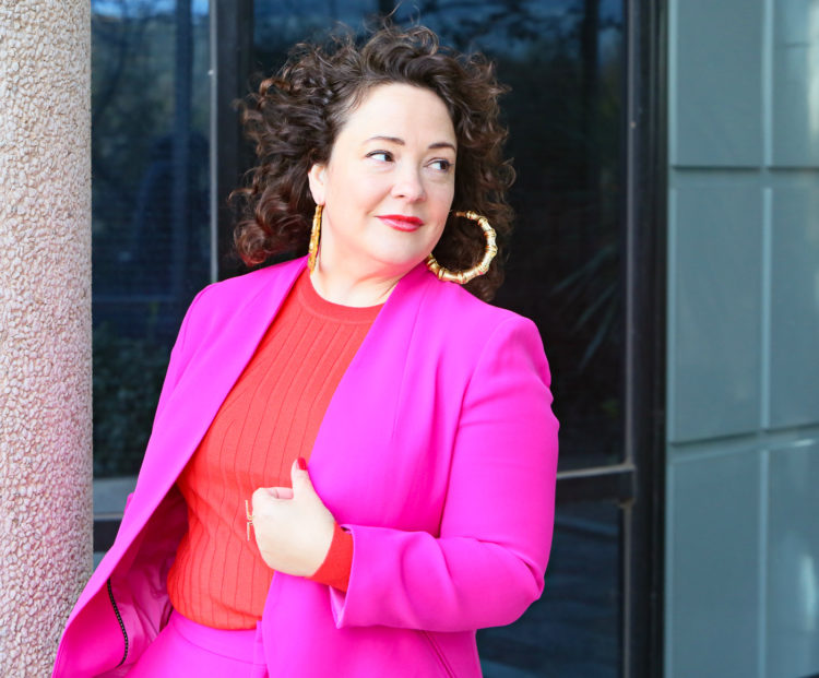 hot pink wide leg pantsuit from Banana Republic with an orange red merino wool crewneck sweater and leopard faux fur coat as seen on over 40 fashion blogger wardrobe oxygen