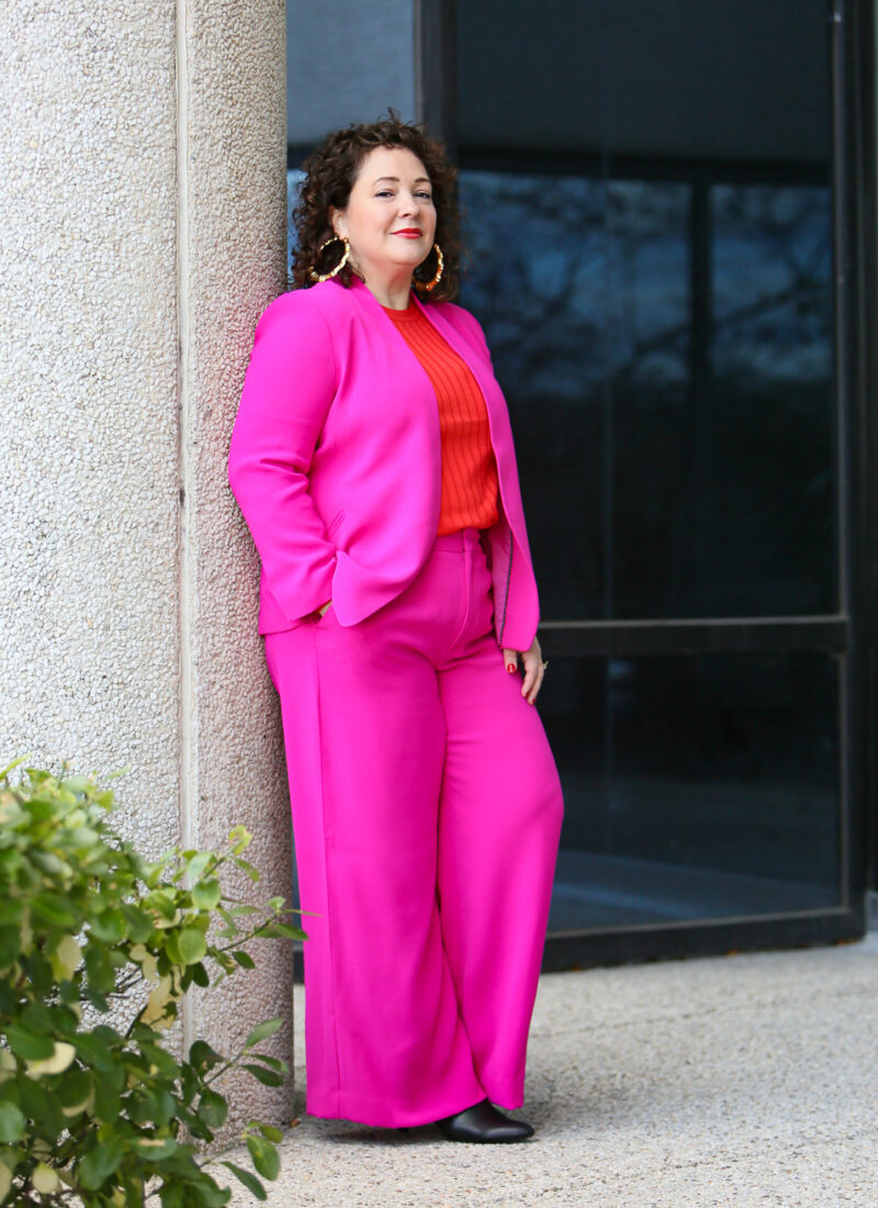 hot pink wide leg pantsuit from Banana Republic with an orange red merino wool crewneck sweater and leopard faux fur coat as seen on over 40 fashion blogger wardrobe oxygen