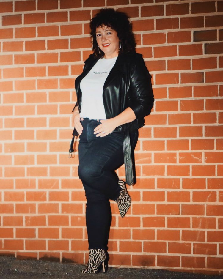 The Universal Standard leather moto jacket and Siene jeans as seen on Alison Gary of Wardrobe Oxygen