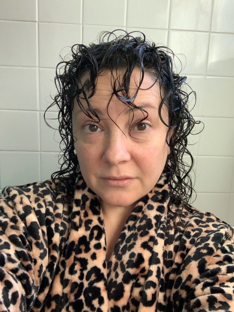 woman with wet curly hair