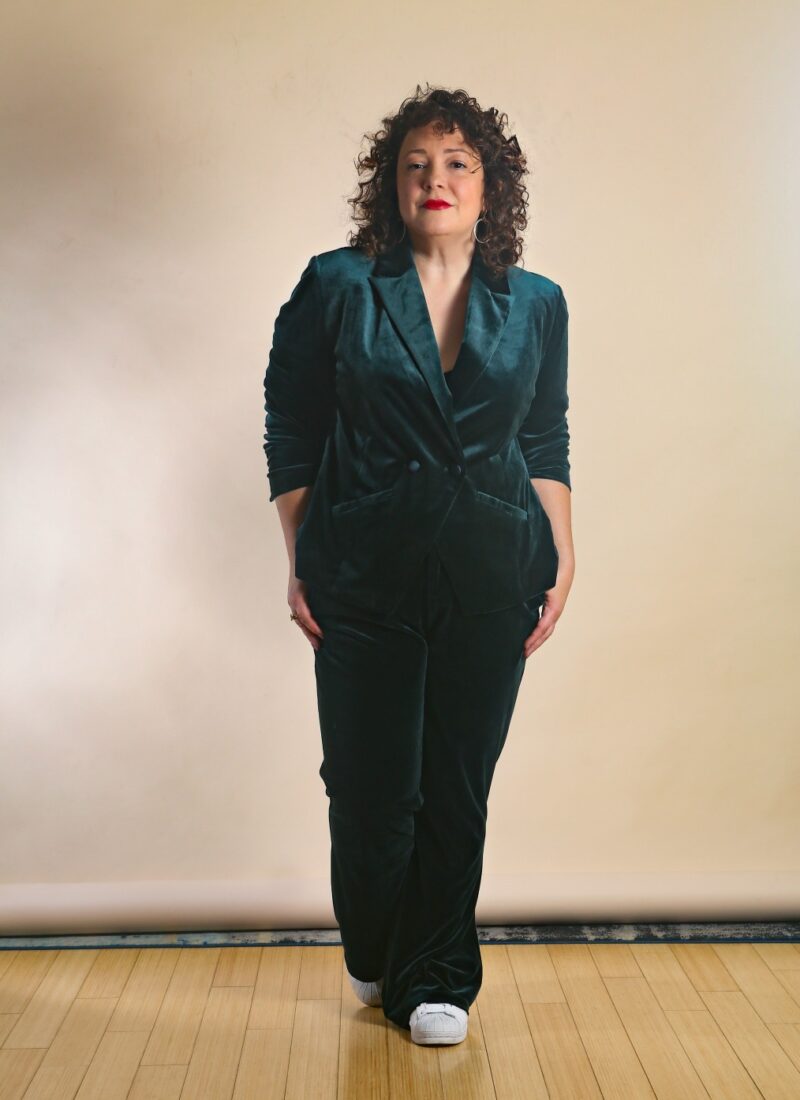 The green velvet pantsuit from Universal Standard as seen on Alison Gary of Wardrobe Oxygen, styled with white Adidas sneakers