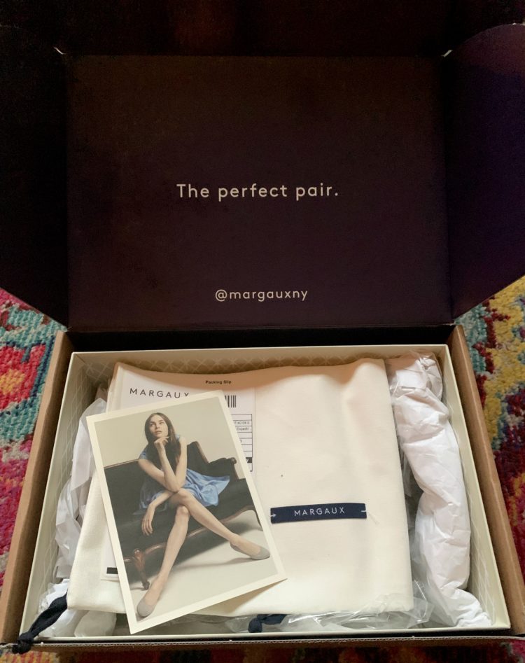 Packaging for a box of Margaux shoes showing the shoe bag and packing slip