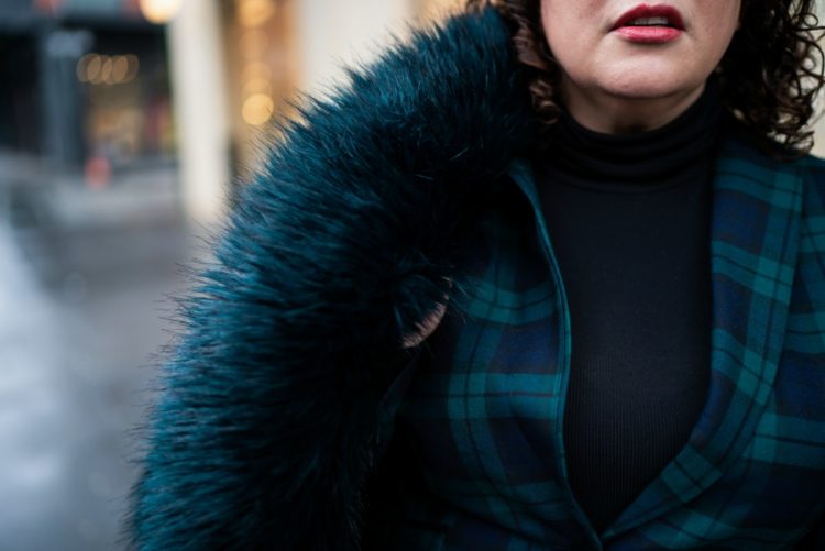 Styling a dark green faux fur coat from Unreal Fur with a green plaid pantsuit and black turtleneck