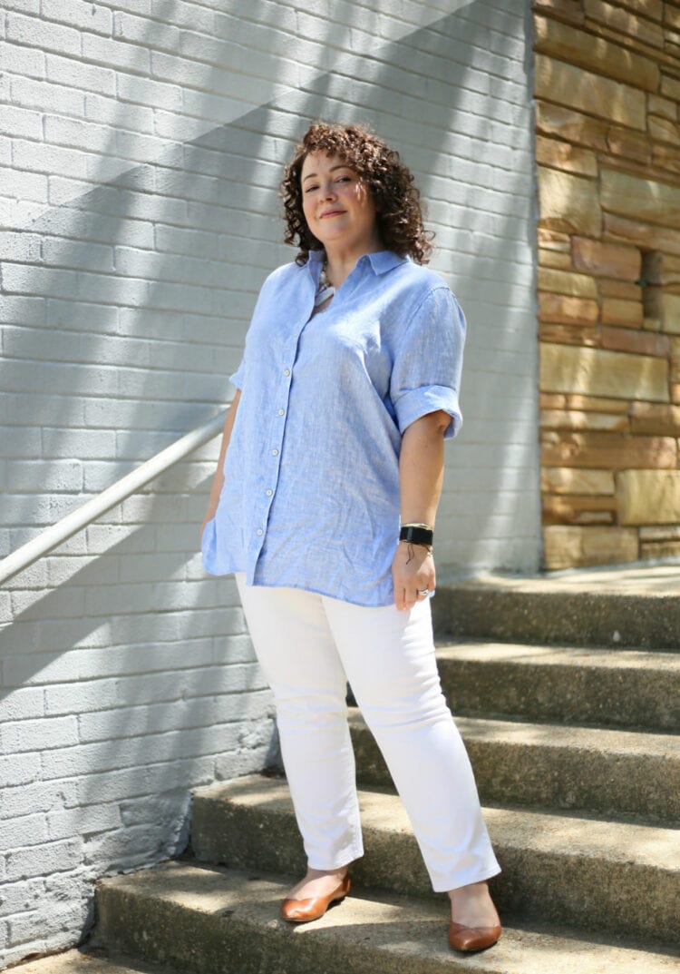 wrinkle-free linen tunic in light blue with white ankle jeans and brown pointed toe flats as seen on Alison