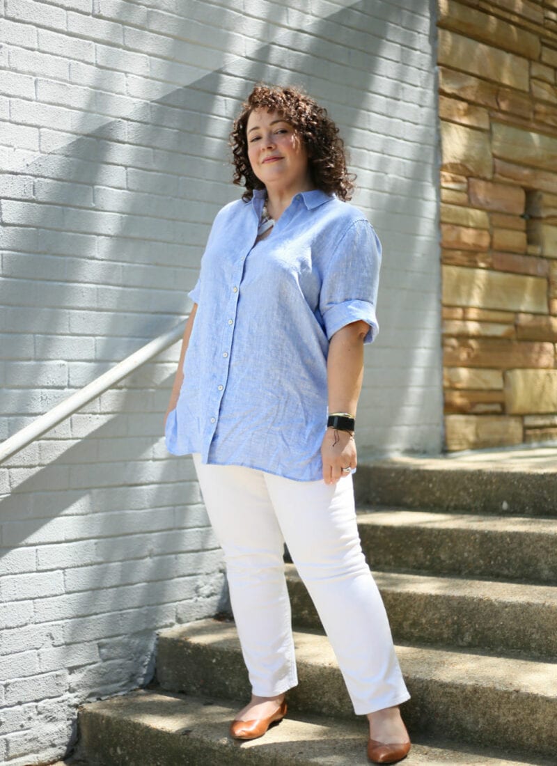 wrinkle-free linen tunic in light blue with white ankle jeans and brown pointed toe flats as seen on Alison