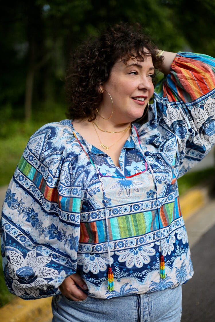 Alison of Wardrobe Oxygen in a Farm Rio blouse and Jenny Bird icon hoops