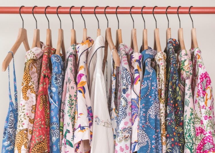 Printfresh review: image of Printfresh pajamas hanging in a row on a clothing rack