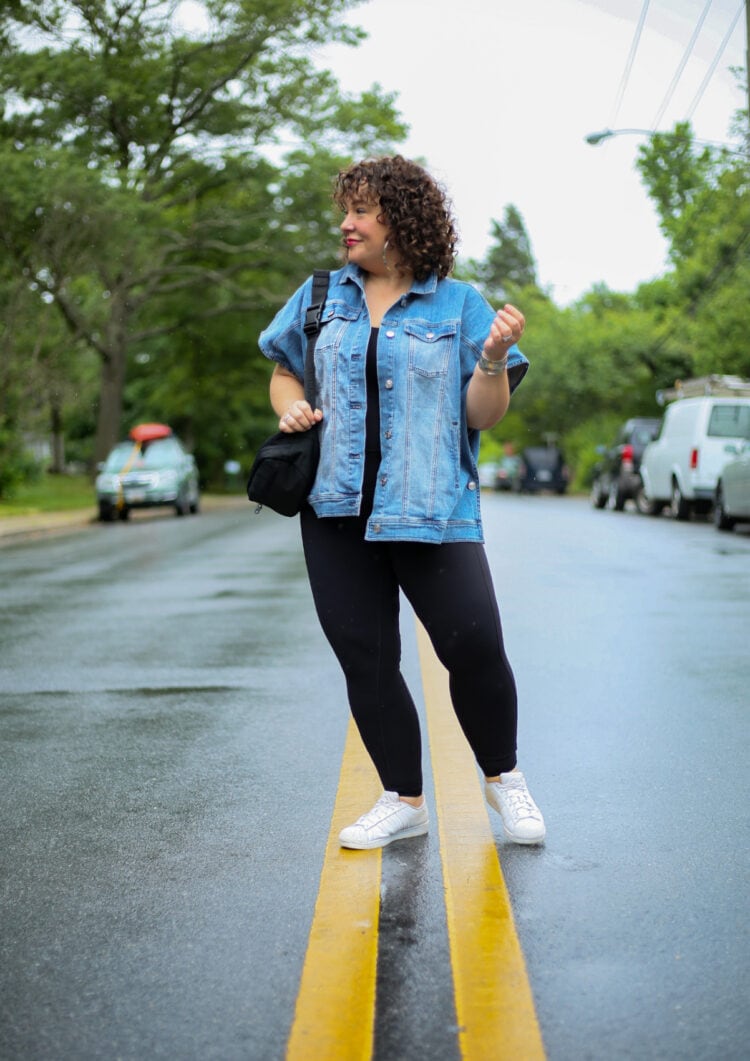 How to style the Universal Standard next to Naked Bodysuit: with a denim jacket or ruana, Adidas Superstar sneakers, and a Girlfriend Collective belt bag worn as a crossbody!