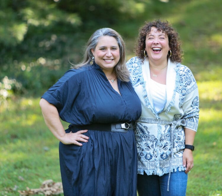 Alison and Carrie together laughing