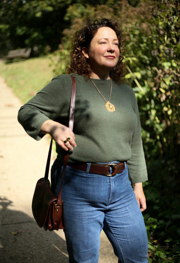 Gold vintage filigree pendant necklace with a green cashmere sweater