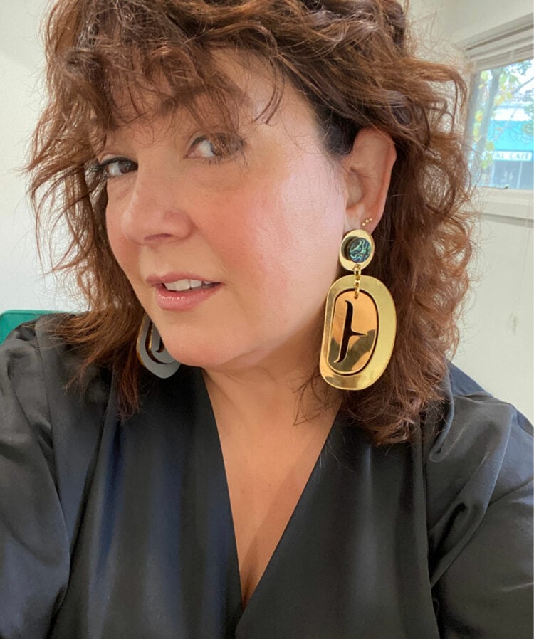 Alison wearing large gold mirrored earrings from Copper Canoe Woman via the online boutique By Yellowtail