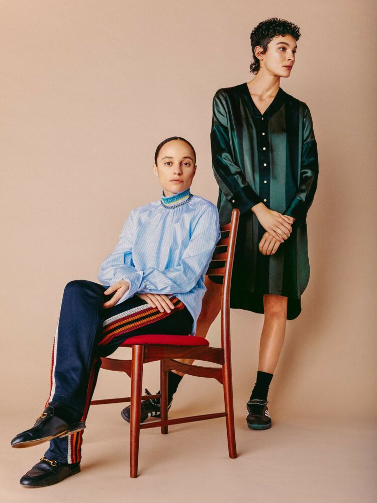 British-Jamaican fashion designer Grace Wales Bonner (seated) and model wearing pieces from her collaboration with Adidas. Image via Porter.
