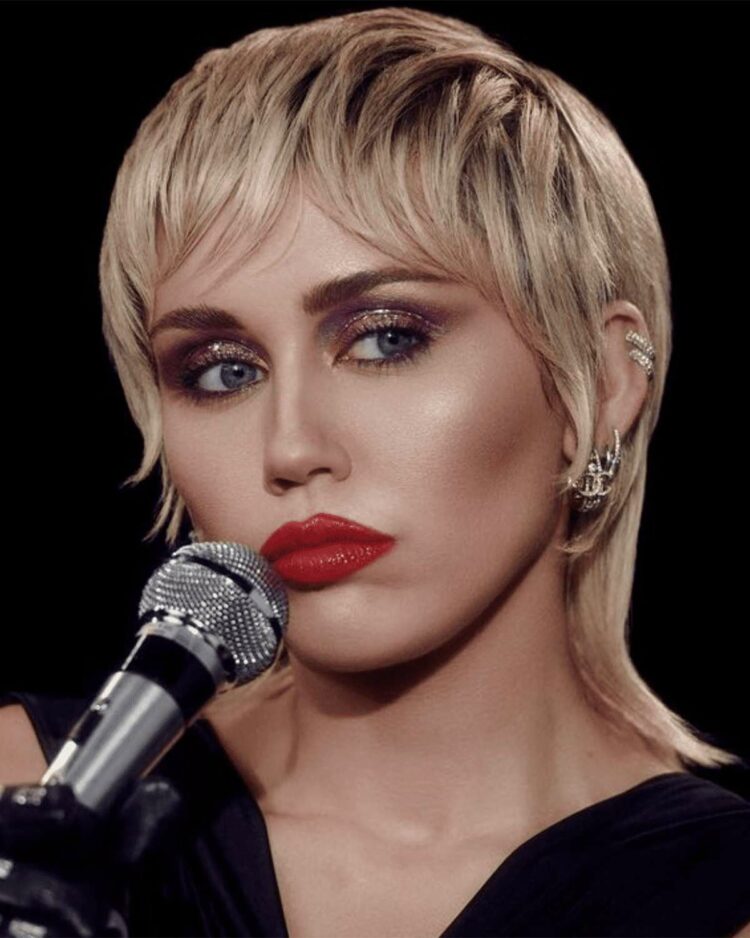 Singer and actress Miley Cyrus with modern mullet haircut