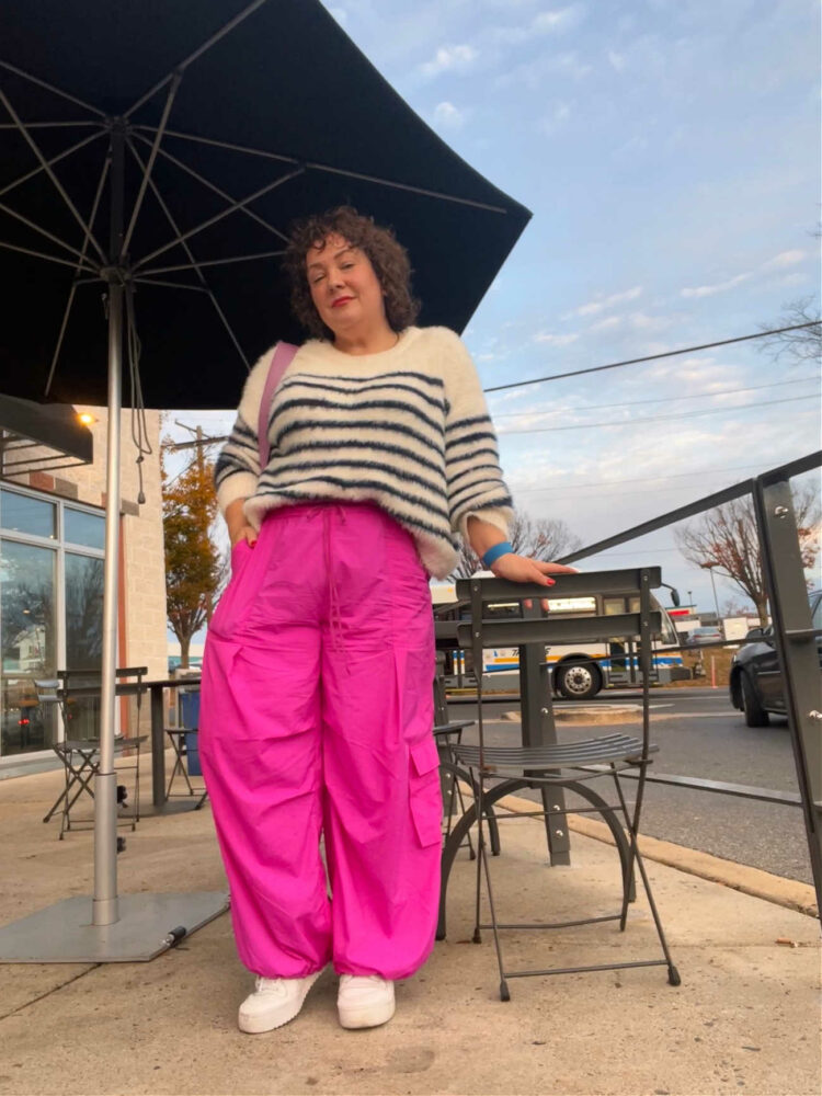 Alison in a Breton striped eyelash sweater from Target and pink parachute pants from Anthropologie