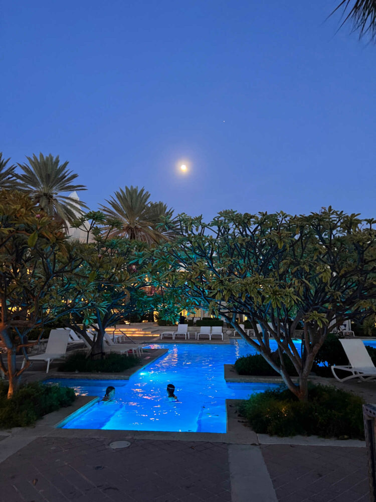 curacao marriott beach resort pool family pool at night with kids playing in the lit water