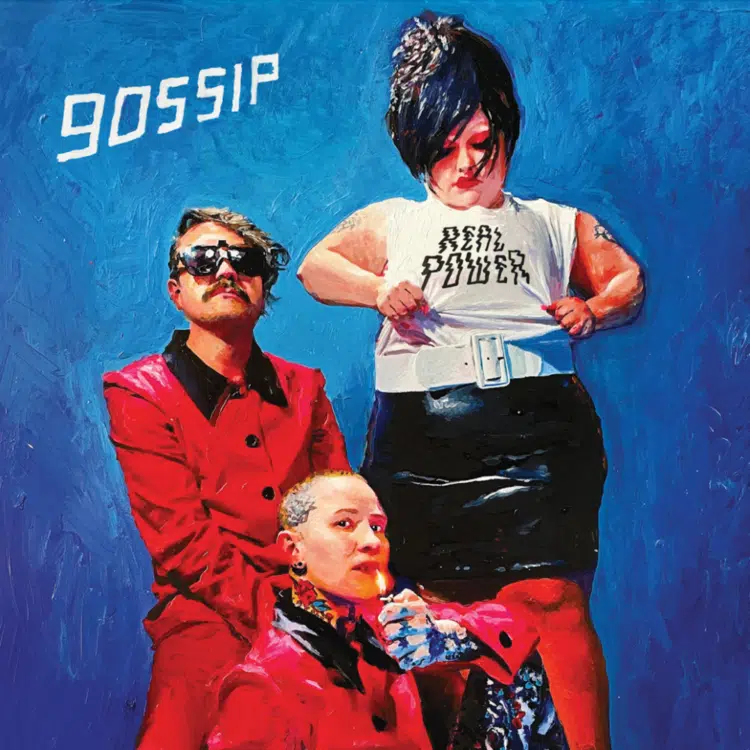 cover of the Gossip band album for Real Power shows the three members of Gossip in front of a blue background