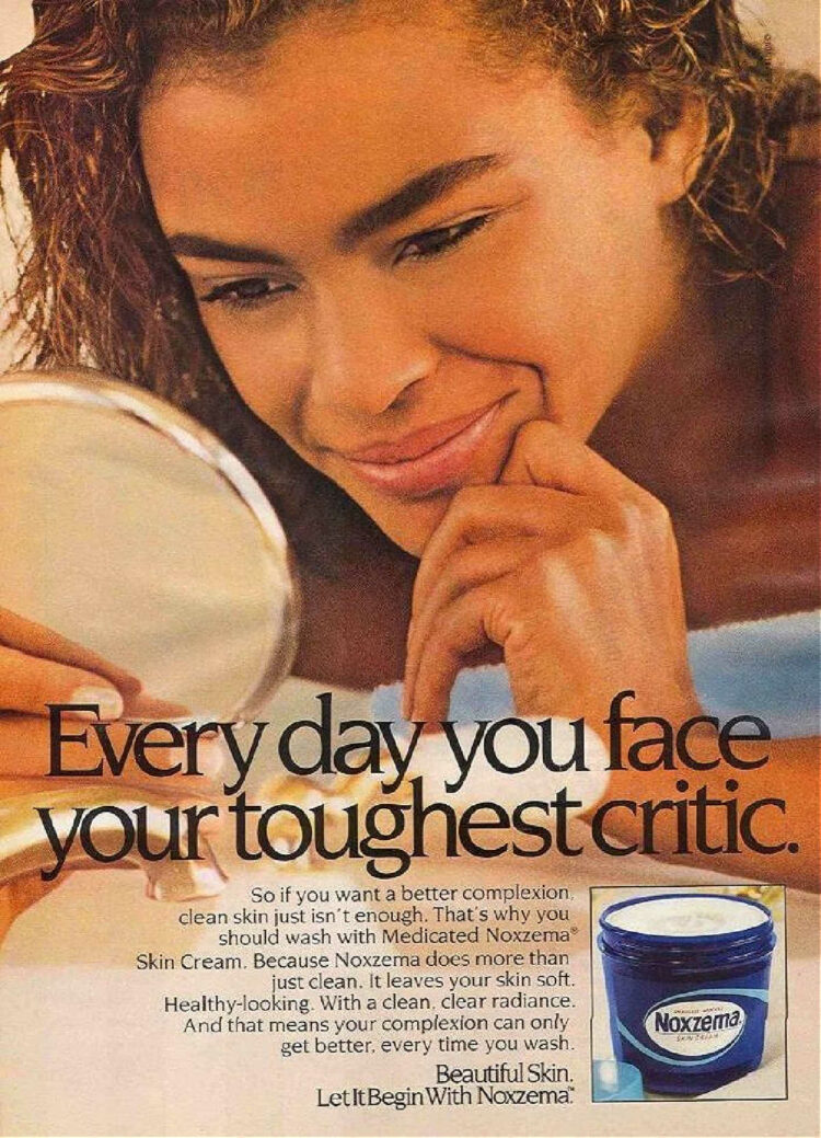 vintage noxzema ad from the 1980s showing a teenager examining her face in a mirror. Overlay text states Every day you face your toughest critic. It is an ad for Noxzema with a jar of the skincare product in the corner