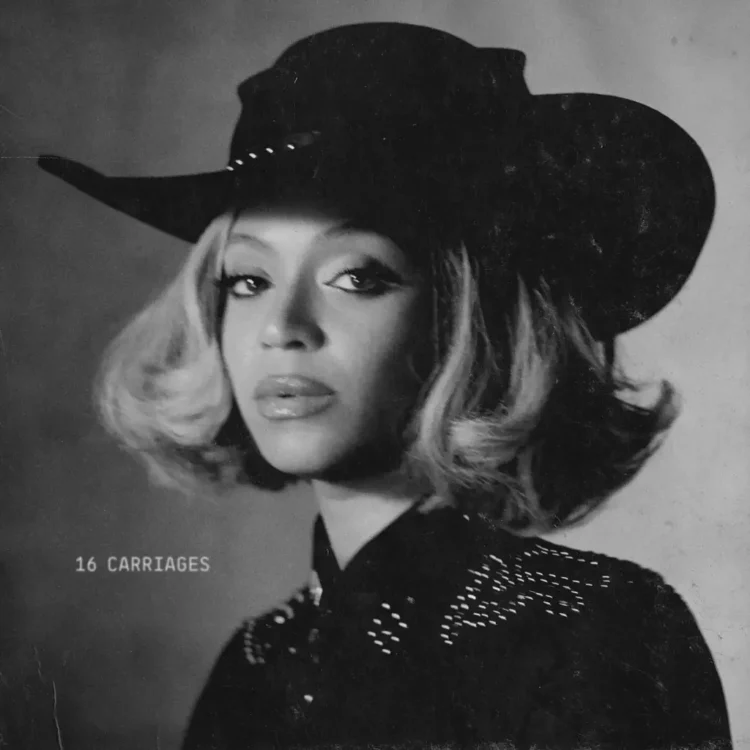 beyonce with a bouncy blonde bob and black cowboy hat, wearing a bedazzled black Western shirt, looking at the camera. The image is in black and white.