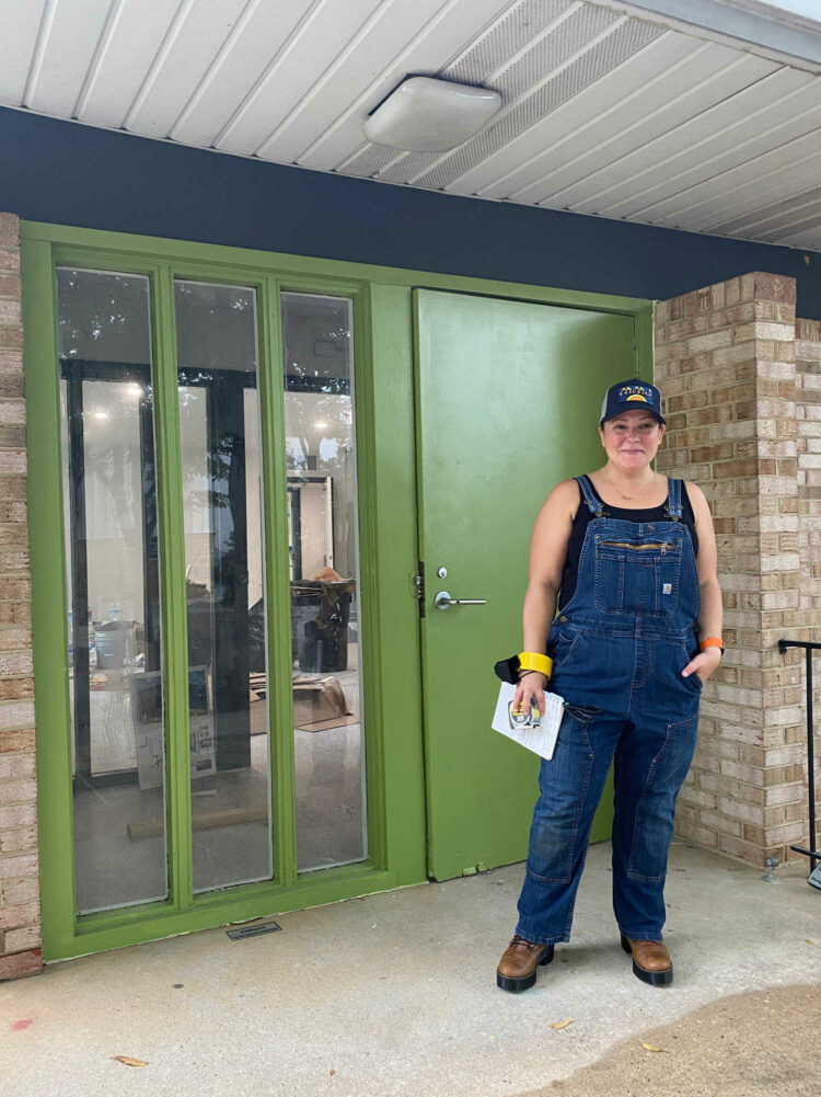 alison gary of wardrobe oxygen in front of the granite building greenbelt