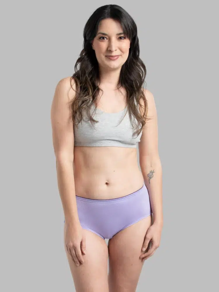 Model wearing a gray bralette and lavender pair of the Fruit of the Loom Breathable Micro-Mesh Low-Rise Brief Panty