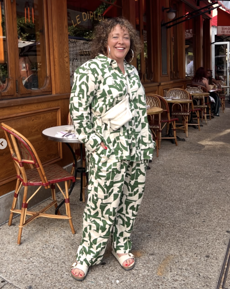 How to Style Wide Leg Pants as a Grown-ass Woman (2026 Guide) 8 Alison Gary of Wardrobe Oxygen in a matching green and white print linen shirt and pants from Universal Standard