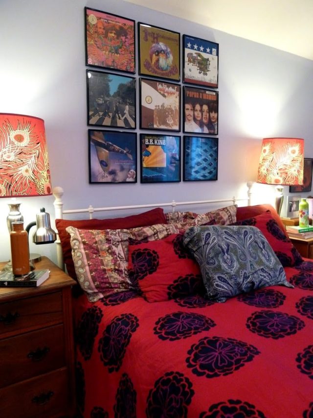 a bed made with colorful printed bedding