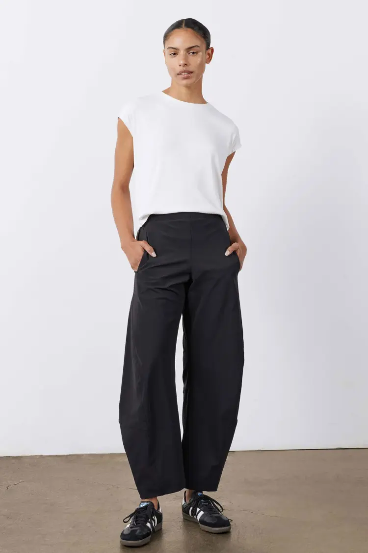 What Are the Best Travel Pants for Women: 9 Extended Size Options Reviewed 1 ruti on the loose work pants are a great travel pant for women in midlife per wardrobe oxygen