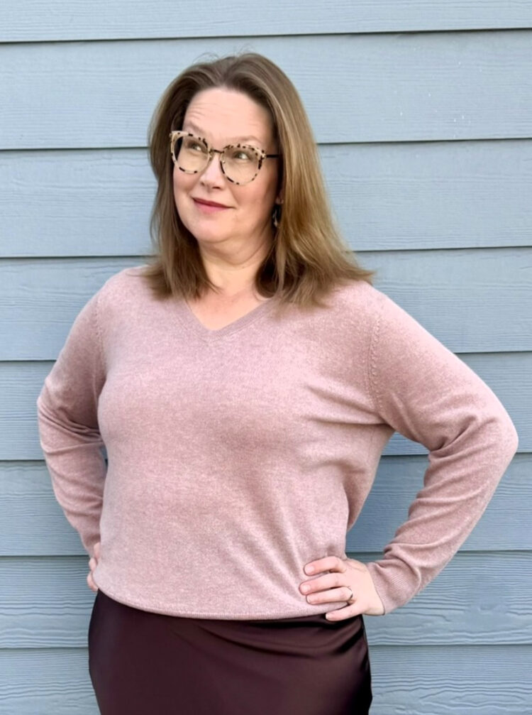 Quince Plus Size Clothing Review: An Honest Community Member Take 4 Tricia wearing the Quince Mongolian Cashmere V-Neck Sweater in Heather Vintage Pink, size 1X