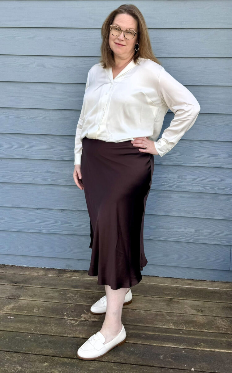 Quince Plus Size Clothing Review: An Honest Community Member Take 1 Tricia wearing the Quince Washable Silk Skirt in Hot Fudge with the Washable Stretch Silk Notch Collar Blouse in Ivory