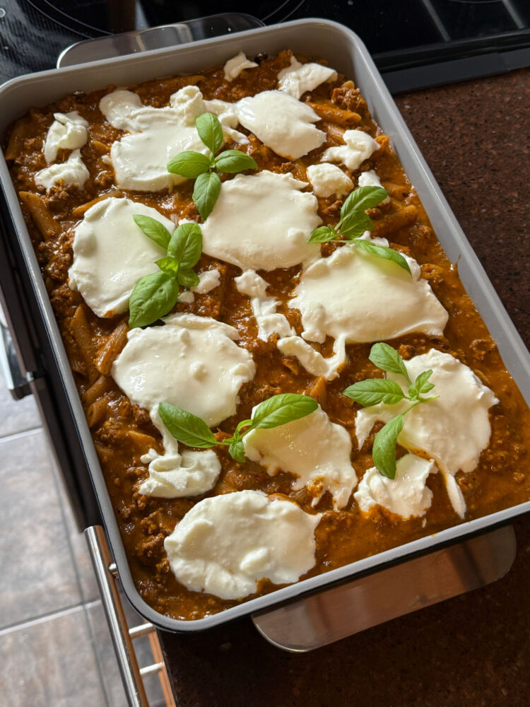 My Husband Wanted to Write This Caraway Bakeware Review (He's a Fan) 8 organic lasagne in a blue rectangular bake pan from caraway home