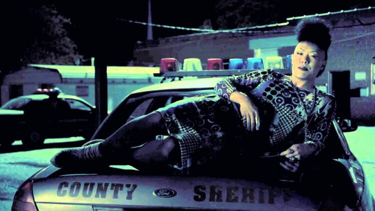 Weekend Reads for the End of February 9 the character job in the tv show banshee lying on the back of a police car