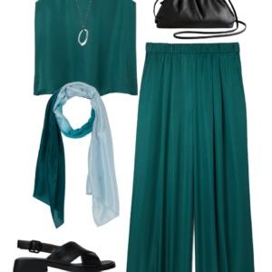 Vacation outfit collage: teal silk tank and teal wide-leg pants with a teal-to-sky-blue ombre scarf, silver pendant necklace, silver ball stud earrings, black leather drawstring crossbody bag, and black Camper Dana crossover sandals.