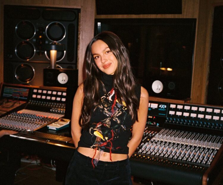 Weekend Reads for Maryland Day Weekend 5 olivia rodrigo standing in a recording studio