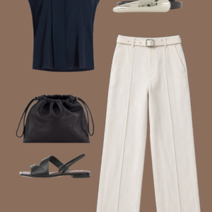 l8 White open-knit cotton-linen sweater tee and olive green hemp shorts with a black leather drawstring pouch and black flat leather sandals