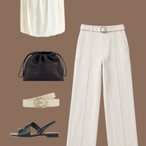 l9 Navy stretch silk shirt and navy linen ankle pants with a black embossed belt, black leather tote, and cream leather sneakers