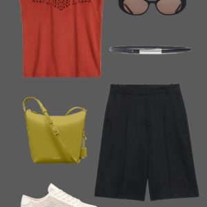 q19 Rust broderie linen tee with black Bermuda shorts, cat-eye sunglasses, black belt, olive leather bucket bag, and white perforated sneakers for a casual summer work travel outfit
