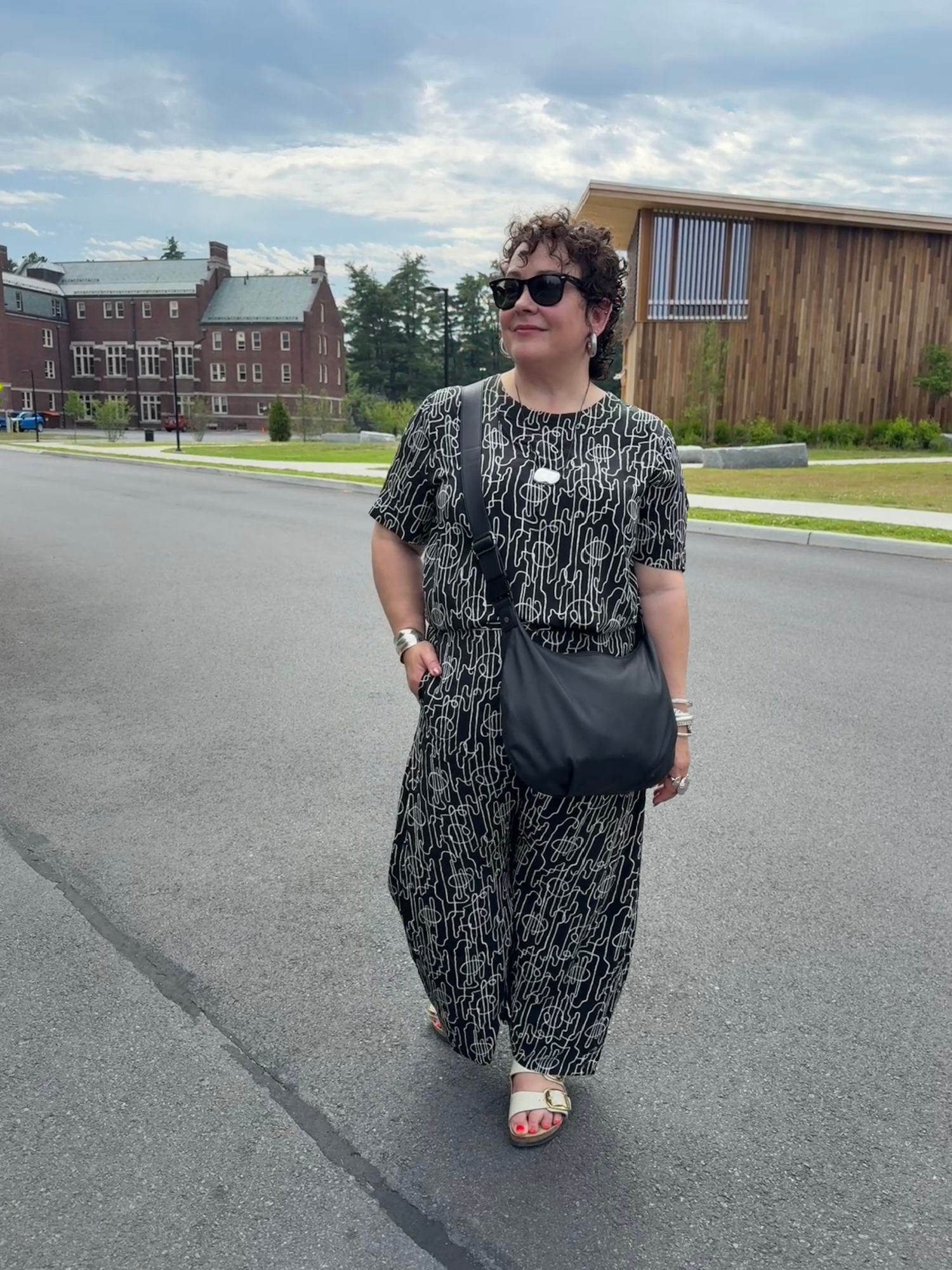 alison in a black and white print washab;e silk matched set from m.m.lafleur with a black leather lo & sons aoyama bag