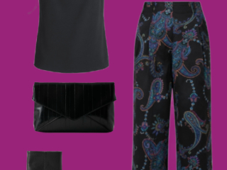 l3 Black sleeveless top and paisley pants: Black draped-neck sleeveless top styled with colorful paisley wide-leg pants, heeled ankle boots, black clutch, and statement earrings.